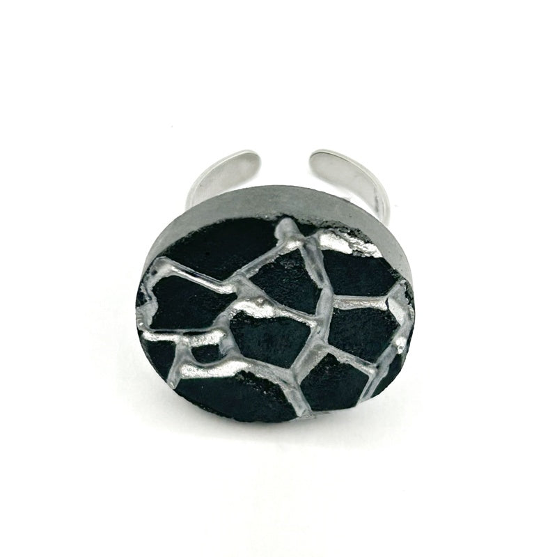 Patti black and silver round ring