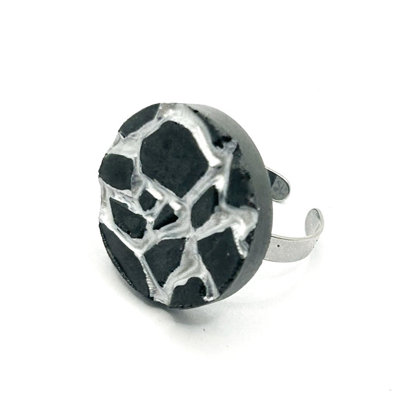 Patti black and silver round ring