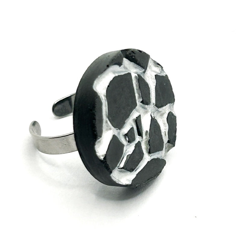 Patti black and silver round ring