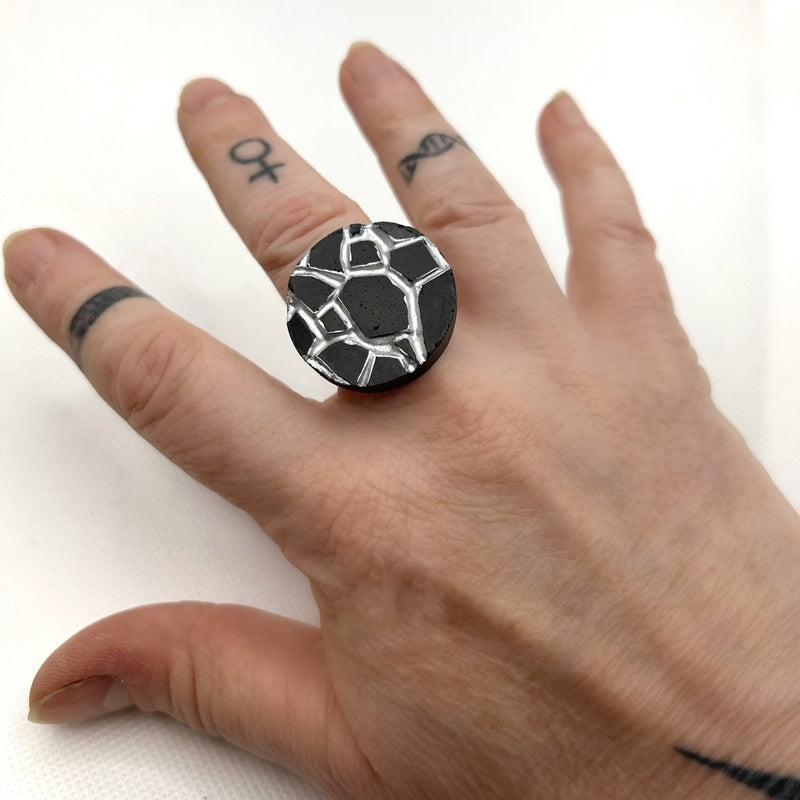 Patti black and silver round ring