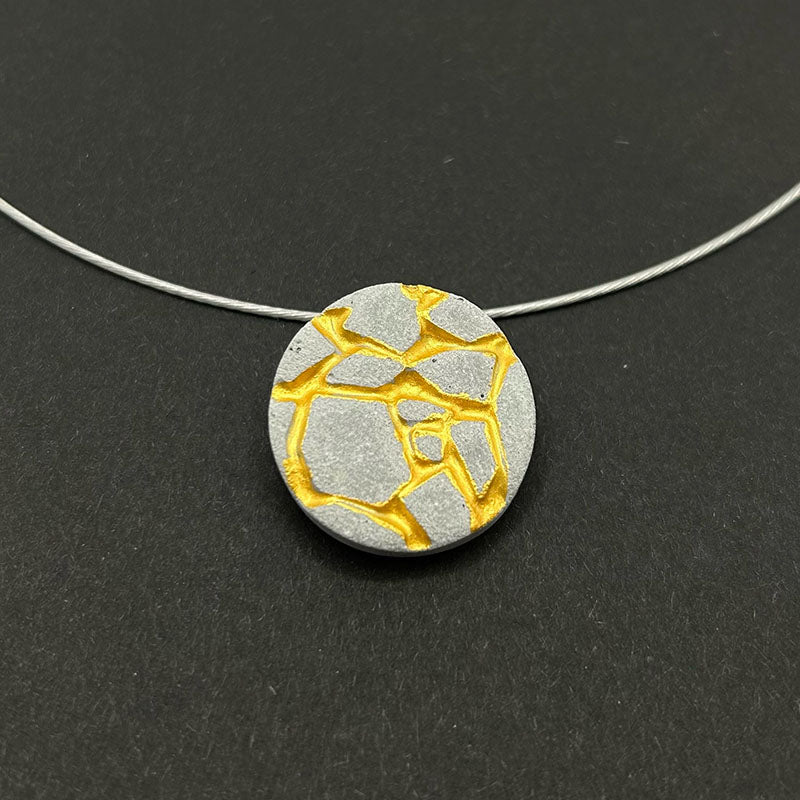 Patti gray and gold round necklace